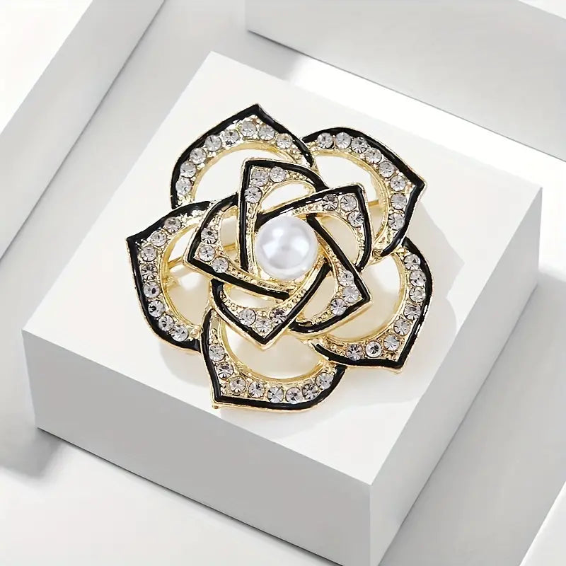 Brooch- Camelia trimmed in gold with faux pearl centre and rhinestone